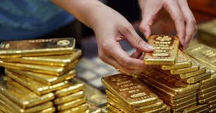 الذهب يربح 9 دولارات ويرتد من أدنى مستوياته في 3 أسابيع