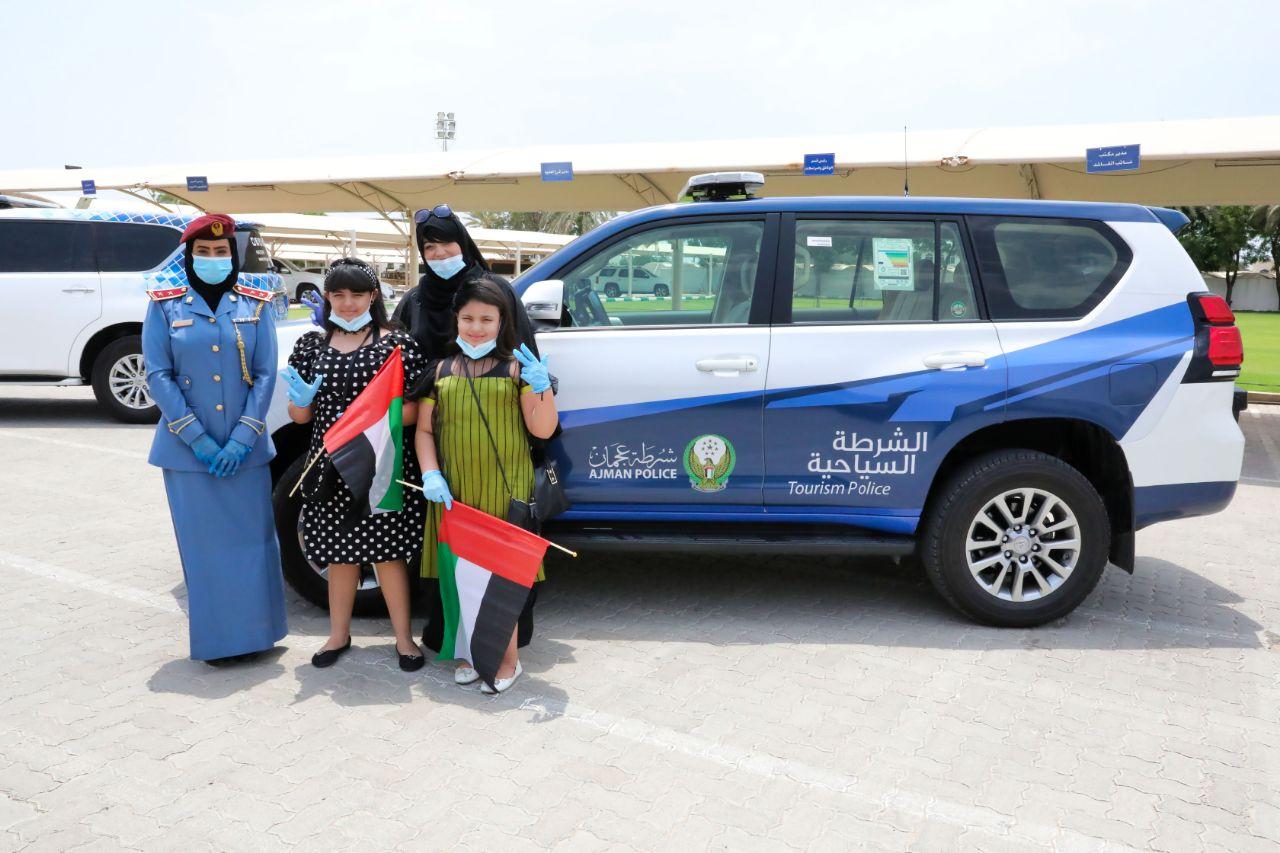 شرطة عجمان تلبي امنية طفلتان بجولة مع الشرطة في عيد الفطر السعيد